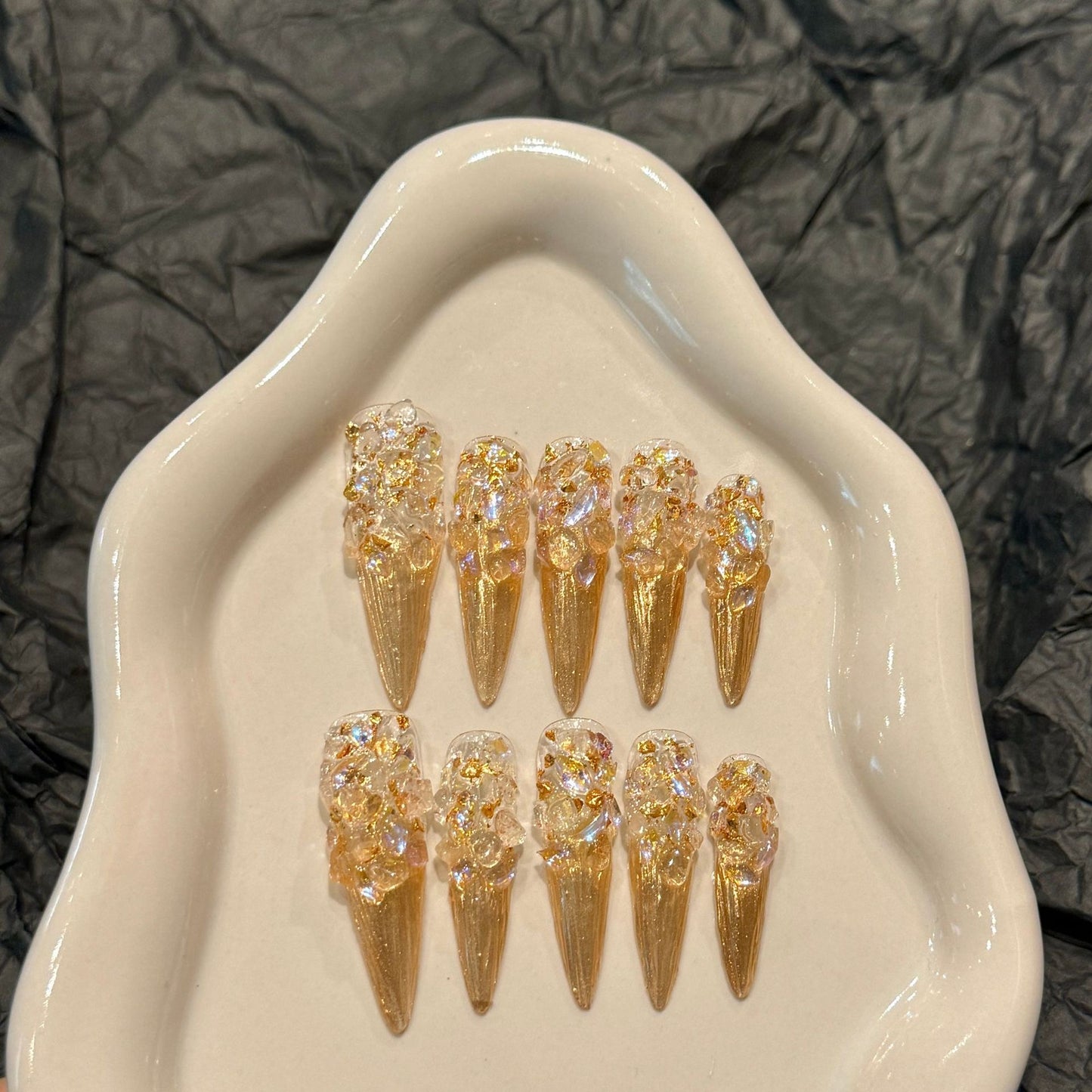 The Golden Nails of the Court
