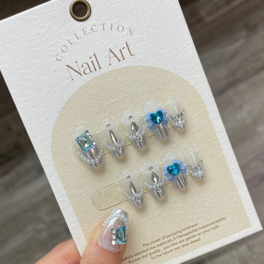 Sparkling Blue Bow Nail